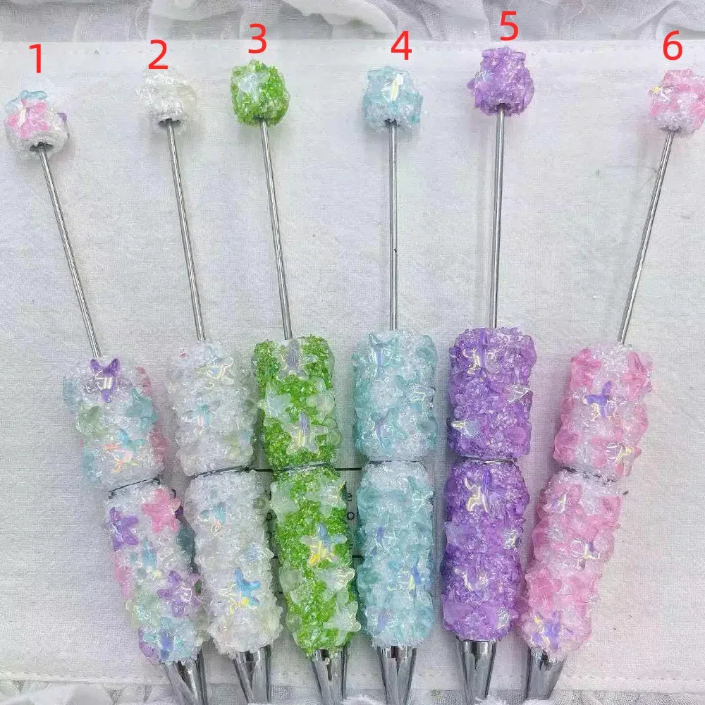 Set of six pastel sugar crystal rhinestone pens with iridescent sparkle in pink, white, green, blue, purple, and pink-white styles.