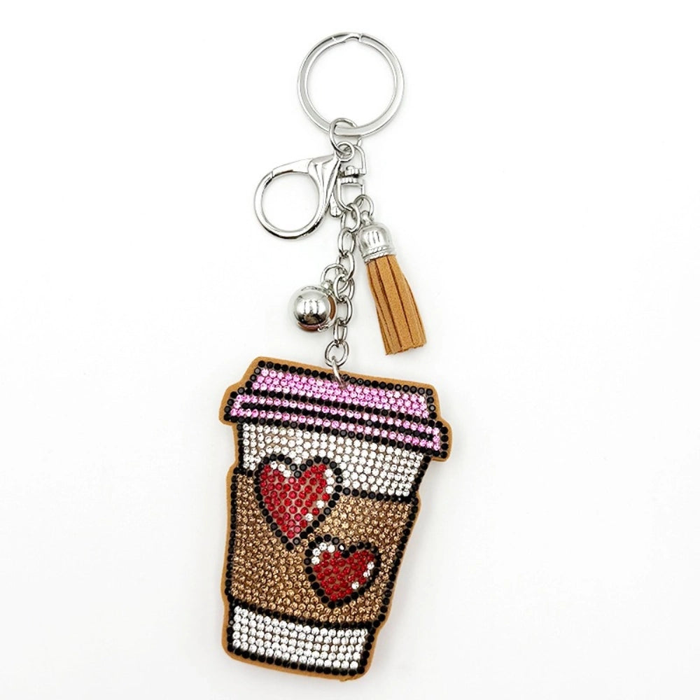 Pink coffee cup rhinestone charm with red hearts, silver key ring, tassel, and bell