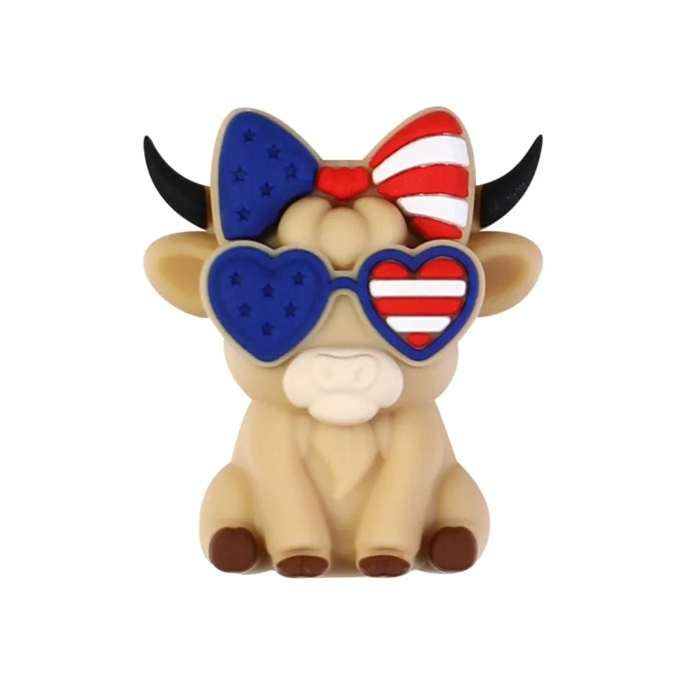 Patriotic God Bless USA silicone focal beads in red, white, and blue featuring roosters, highland cows with heart sunglasses, bows, and coffee mugs on a white background. - 8