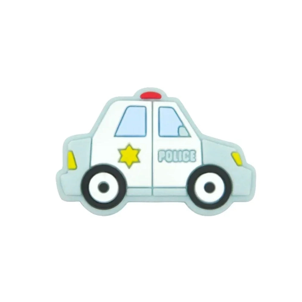 Six cartoon police car silicone focal beads in white, blue, black, mint green, light teal, and yellow displayed on a small wooden bench against a blue background, each featuring a gold sheriff star badge and POLICE text. - 5