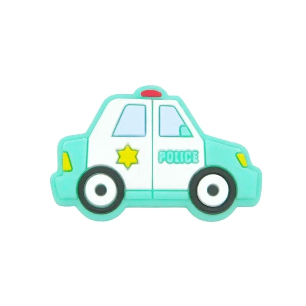 Six cartoon police car silicone focal beads in white, blue, black, mint green, light teal, and yellow displayed on a small wooden bench against a blue background, each featuring a gold sheriff star badge and POLICE text. - 7