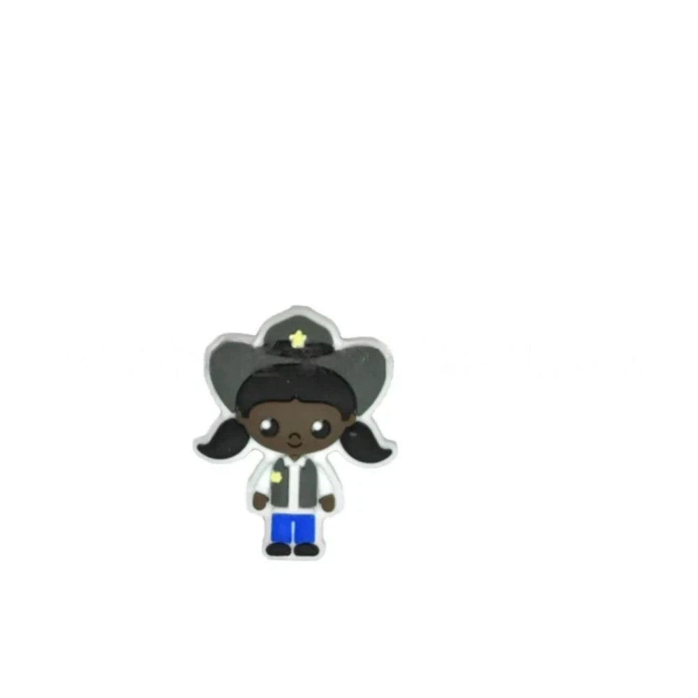 Assorted police girl silicone focal beads in multiple skin tones displayed on a white ceramic dish, featuring cute cartoon cop characters in blue uniforms with stars, perfect for beadable pens, keychains, and badge reels. - 4