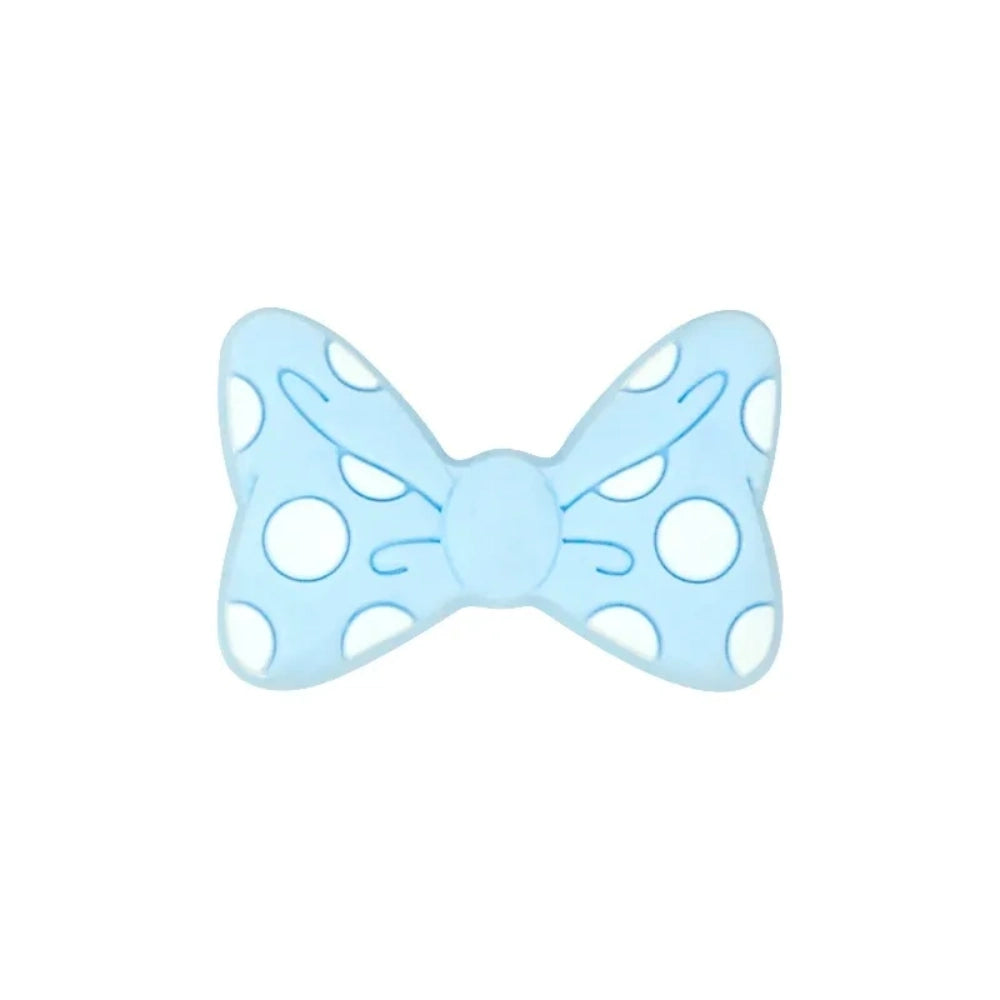 Assorted pastel and bold color polka dot bow silicone focal beads with white dots, arranged in a circle on a white background, for DIY jewelry making and beadable pens. - 9