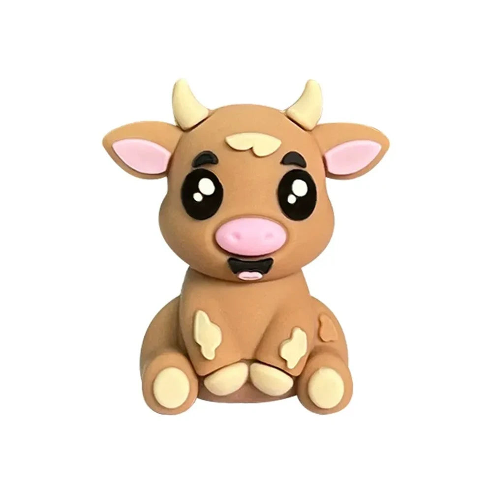 Set of 6 cute 3D baby cow silicone focal beads in white, tan, brown, and black color variants displayed on a miniature wooden bench against a yellow background. - Camel