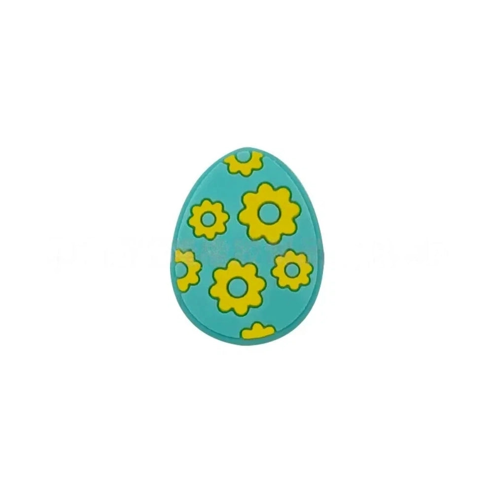 Set of 6 Easter egg silicone flatback focal beads decorated with yellow daisy flowers in white, mint, teal, purple, light pink, and hot pink colorways. - Green-1