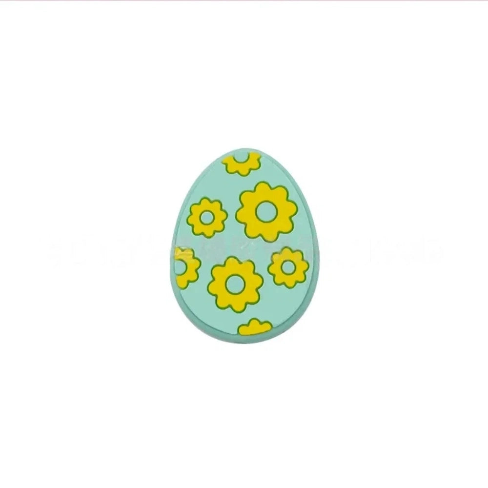 Set of 6 Easter egg silicone flatback focal beads decorated with yellow daisy flowers in white, mint, teal, purple, light pink, and hot pink colorways. - Green-2
