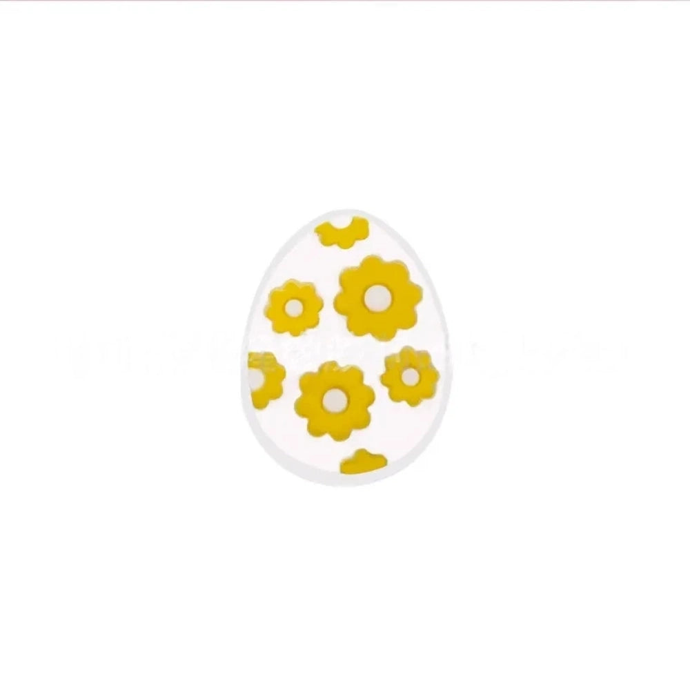 Set of 6 Easter egg silicone flatback focal beads decorated with yellow daisy flowers in white, mint, teal, purple, light pink, and hot pink colorways. - White