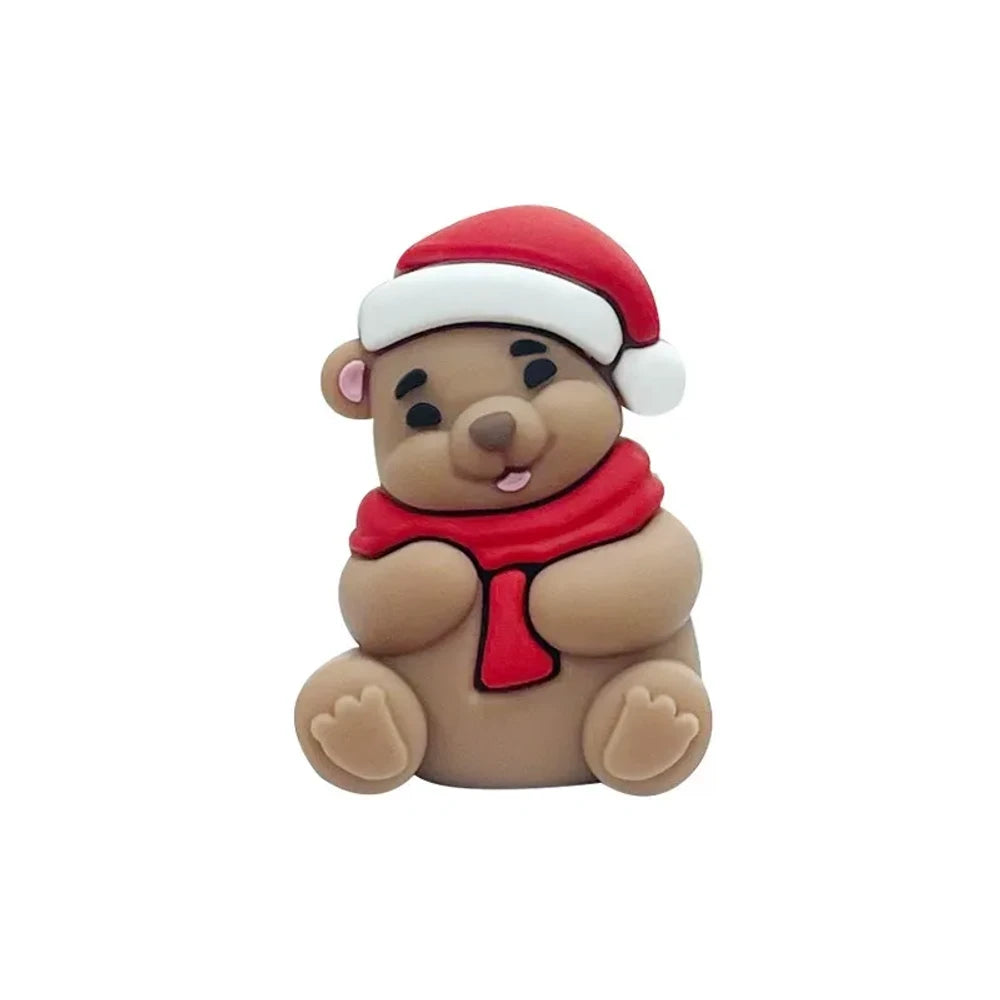 3D Christmas Santa Bear silicone focal beads in tan and brown colors wearing red Santa hats and scarves, displayed on white clay surface with pink background - Camel