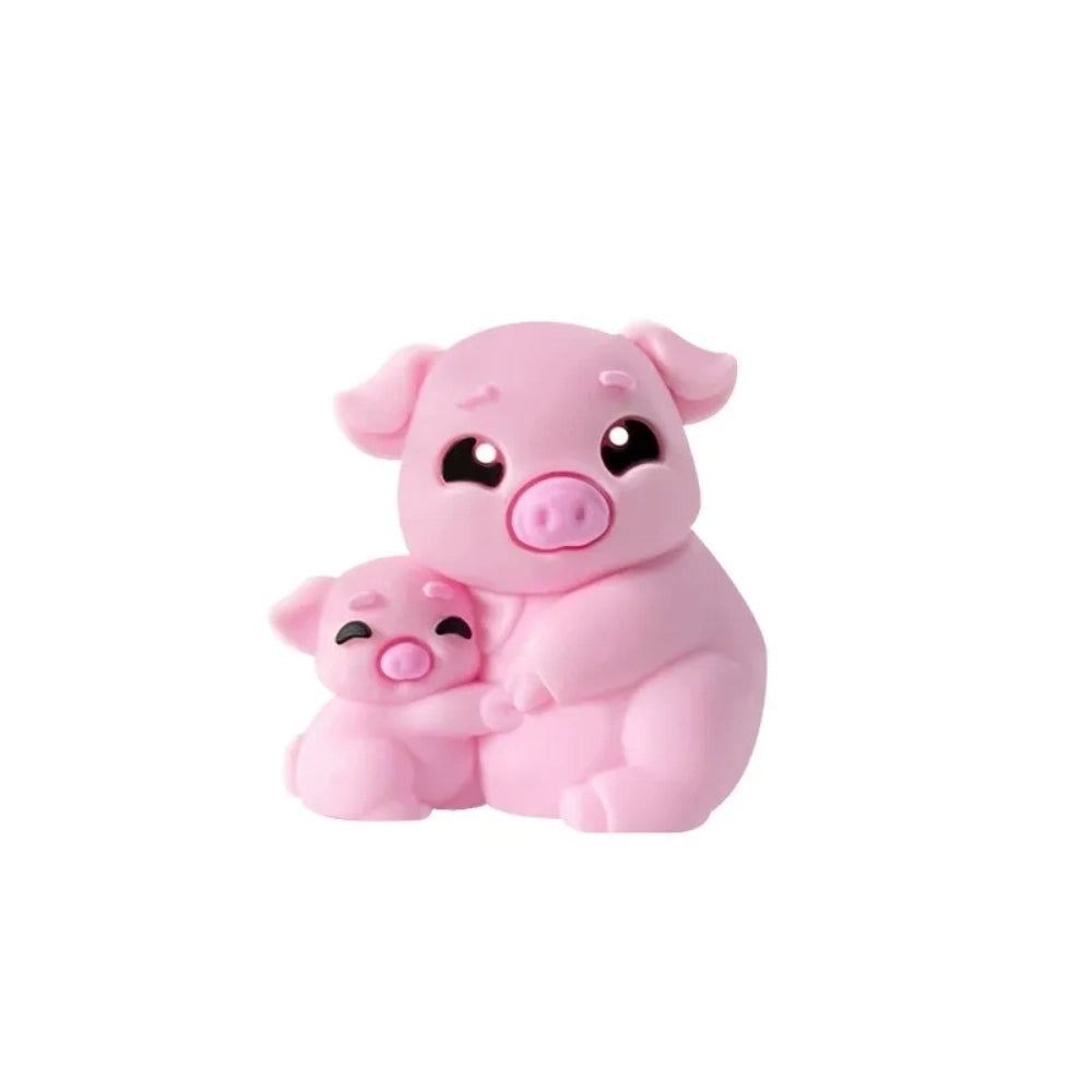 Cute 3D silicone focal beads shaped like a mama pig hugging a baby piglet, shown in light pink and mauve colorways, front and back views displayed on a white pedestal with pink background. - Pink