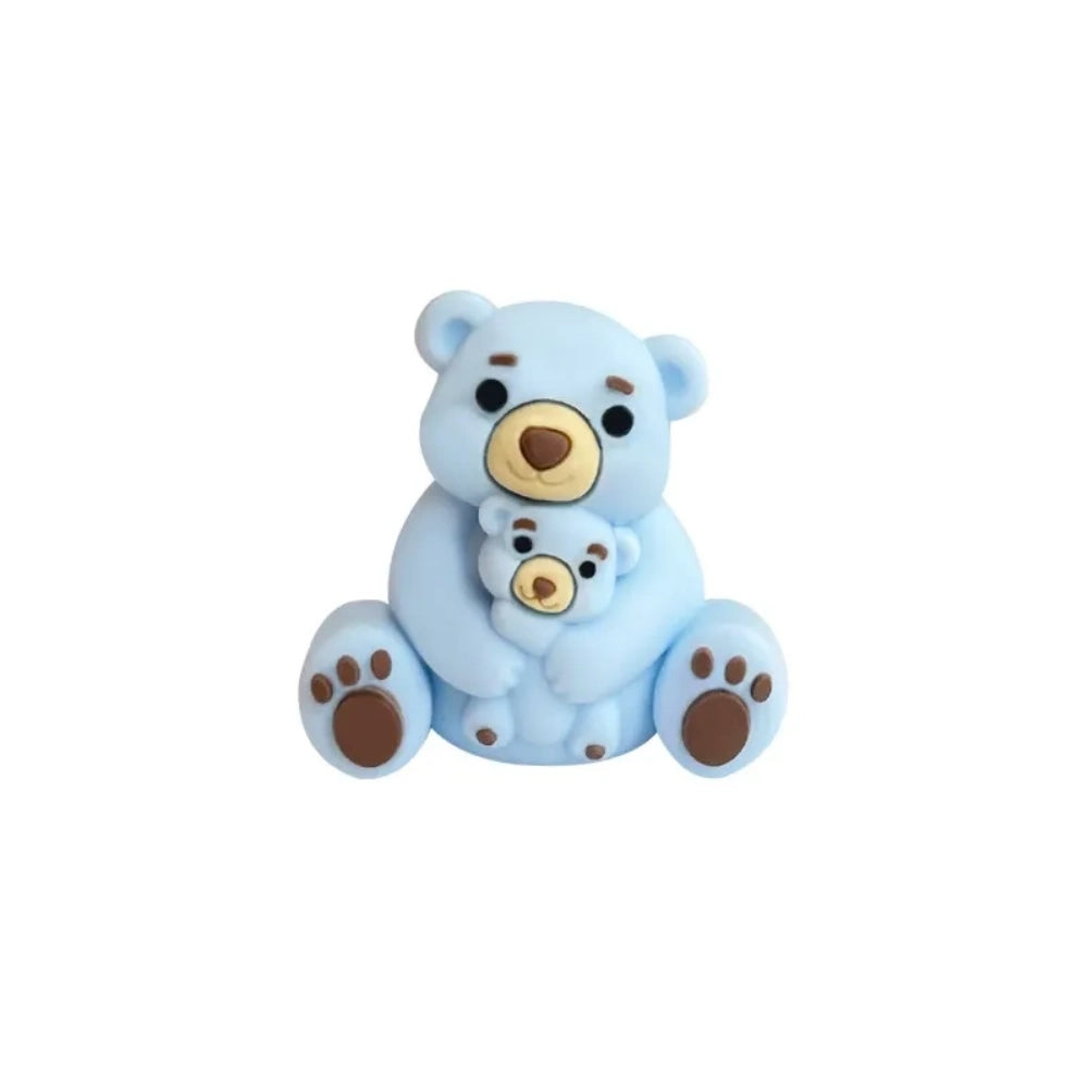 Six colorful 3D silicone focal beads shaped like a mama bear hugging a baby bear, available in gray, brown, yellow, pink, dusty pink, and blue, displayed on a white pedestal with a pink background. - 1