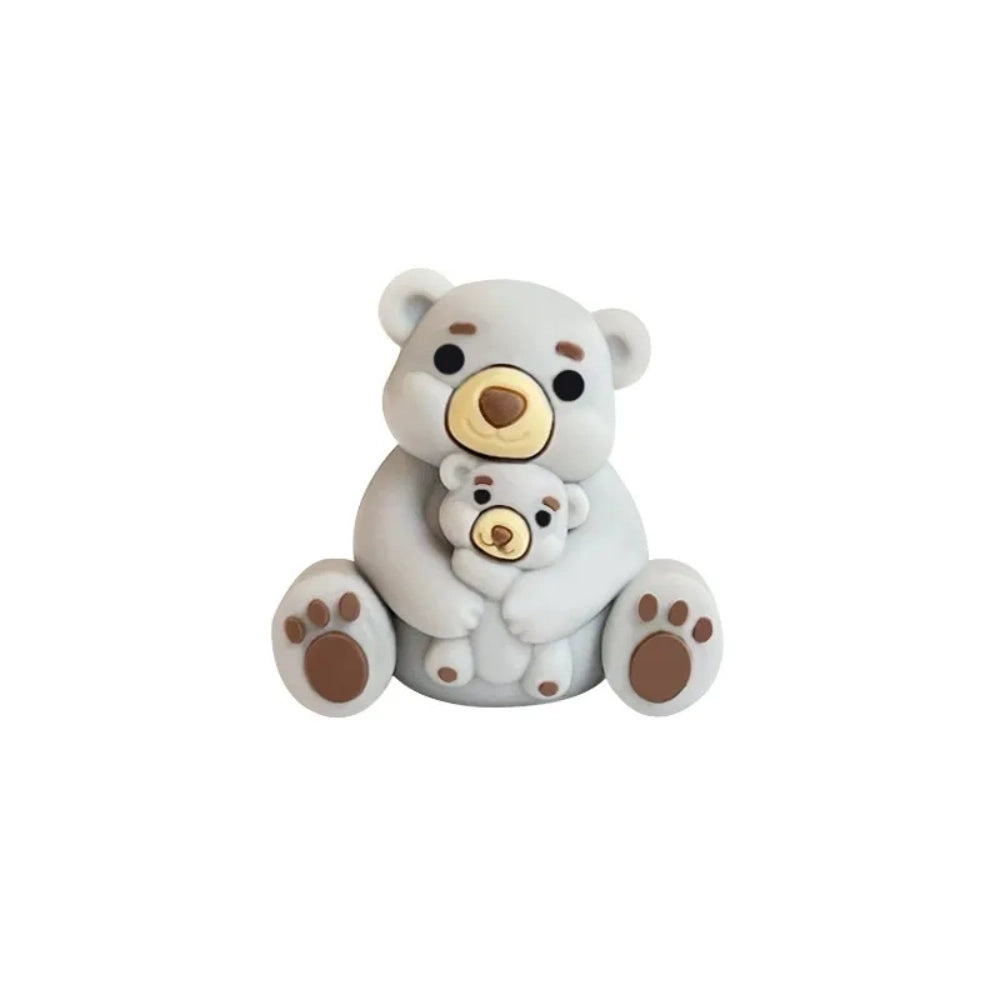 Six colorful 3D silicone focal beads shaped like a mama bear hugging a baby bear, available in gray, brown, yellow, pink, dusty pink, and blue, displayed on a white pedestal with a pink background. - 6