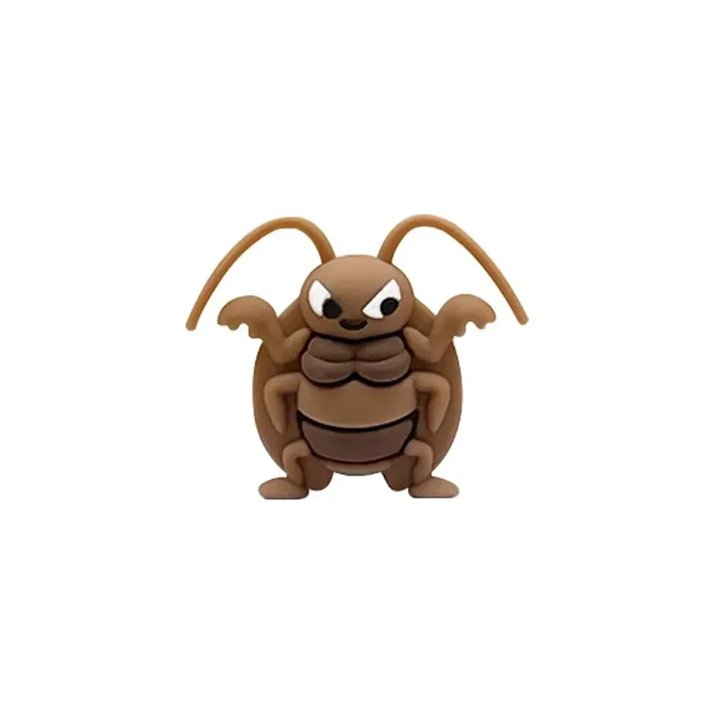 Six cartoon angry cockroach silicone focal beads in brown, blue, and purple displayed on a miniature white wooden bench against a yellow background. - Camel