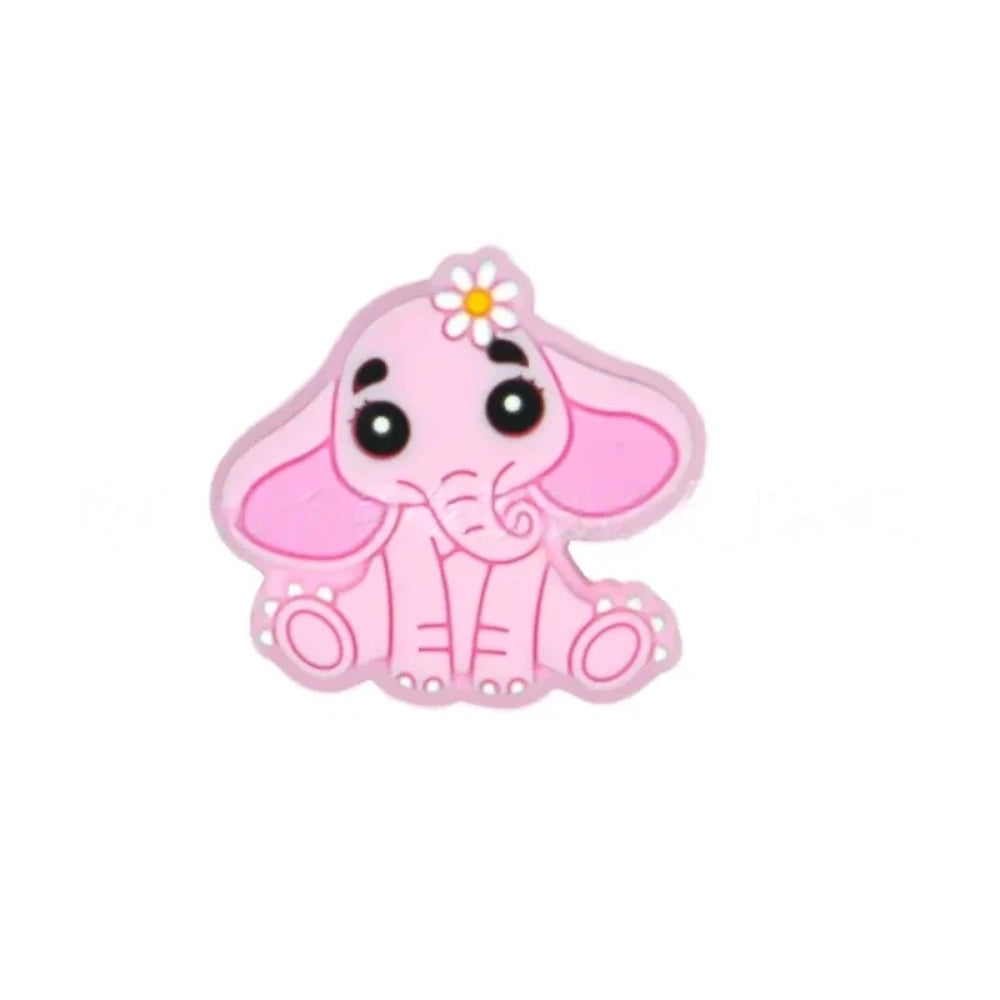 Four silicone focal beads shaped like cute baby elephants with daisy flowers, available in pink, gray, dark gray, and light blue colorways, each featuring pink inner ears and big expressive eyes. - Brown