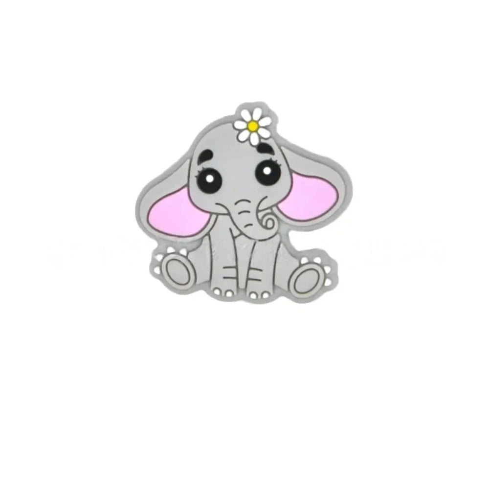 Four silicone focal beads shaped like cute baby elephants with daisy flowers, available in pink, gray, dark gray, and light blue colorways, each featuring pink inner ears and big expressive eyes. - Coffee