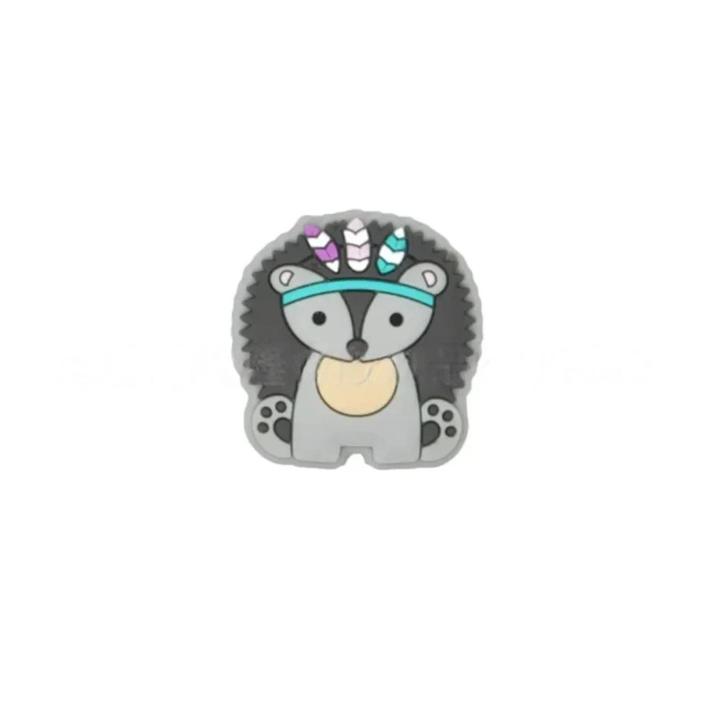 Five boho tribal animal silicone focal beads in pink, blue, yellow, brown, and gray featuring hedgehog, elephant, and lion characters wearing feathered headbands, displayed on a white background. - Gray