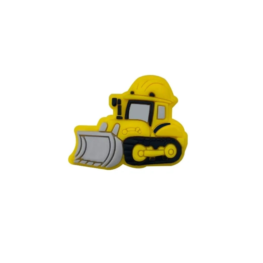 Five colorful silicone bulldozer construction truck focal beads in yellow, dark yellow, orange, blue, and mint green displayed on a white round platform - Yellow-2