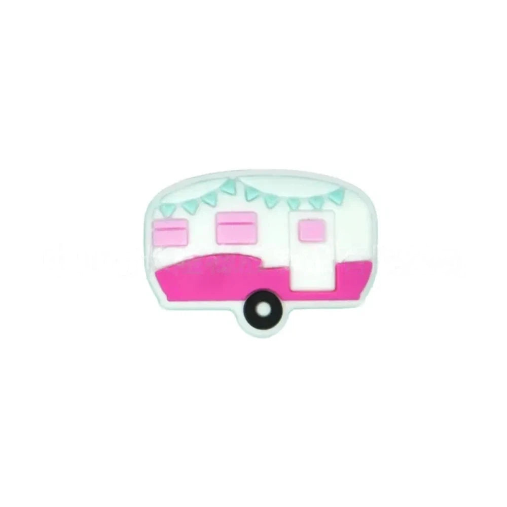 Four silicone camper trailer flatback focal beads in red, black, teal, and pink with bunting flag details on a teal background - Purple-Red