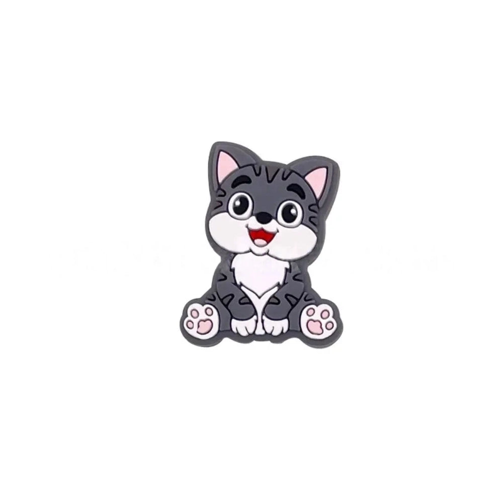 Nine colorful cartoon kitten cat silicone focal beads shown in blue, orange, mint, gray, tan, yellow, pink, dark gray, and brown on white background. - Dark Gray