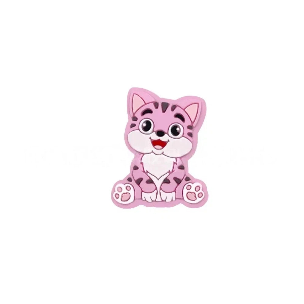 Nine colorful cartoon kitten cat silicone focal beads shown in blue, orange, mint, gray, tan, yellow, pink, dark gray, and brown on white background. - Pink