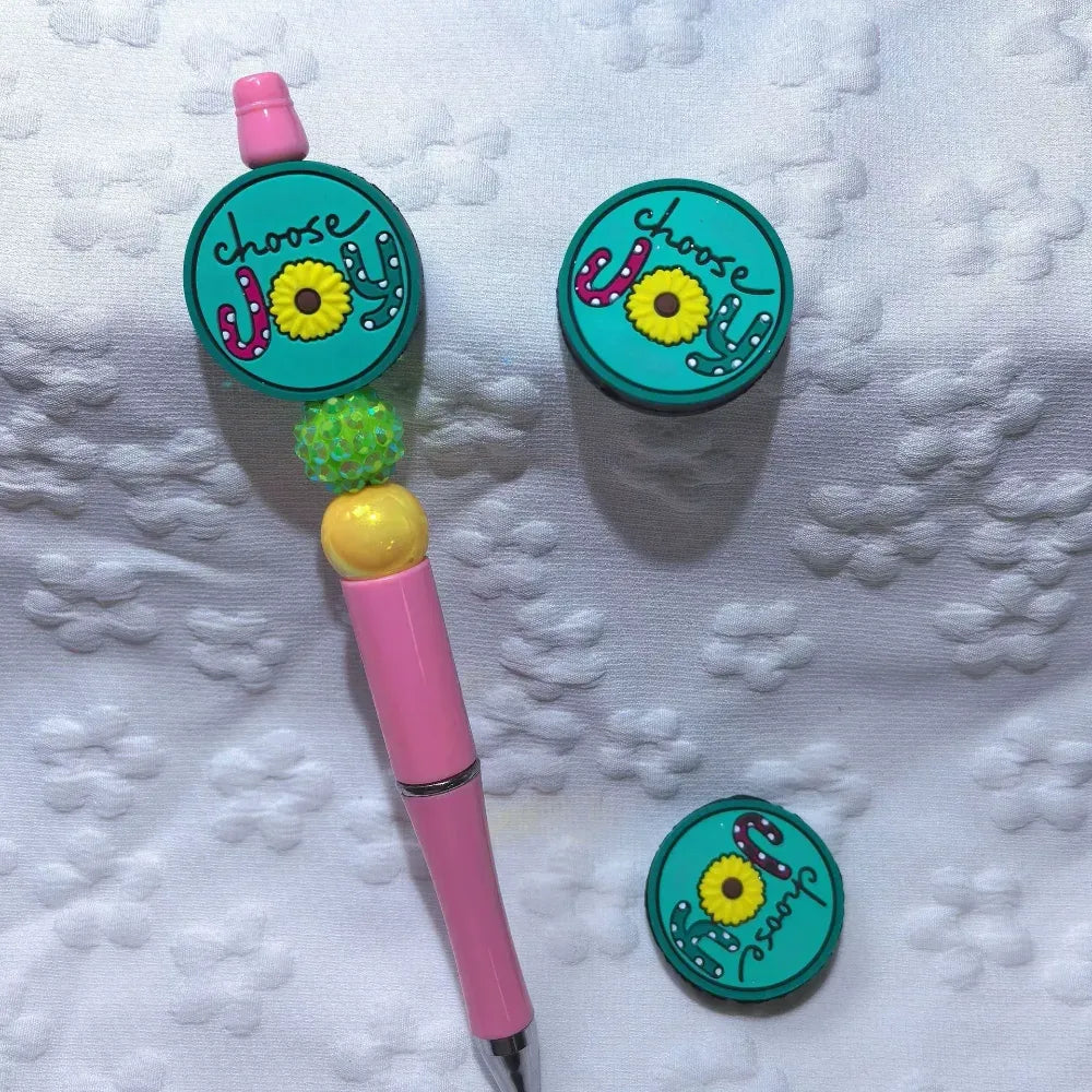 Set of six silicone focal beads featuring Choose Joy sunflower, Deer Hunter buck mount, and Rather Be Fishing bass designs in teal, brown, and green colorways. - 1