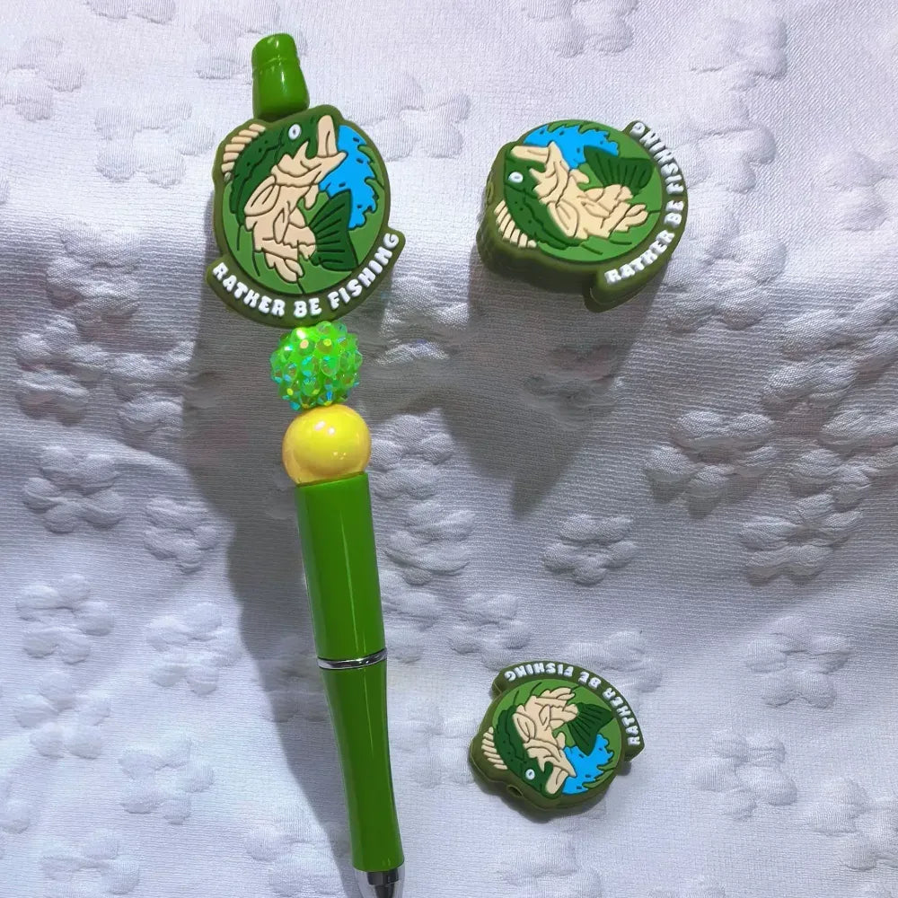Set of six silicone focal beads featuring Choose Joy sunflower, Deer Hunter buck mount, and Rather Be Fishing bass designs in teal, brown, and green colorways. - 3