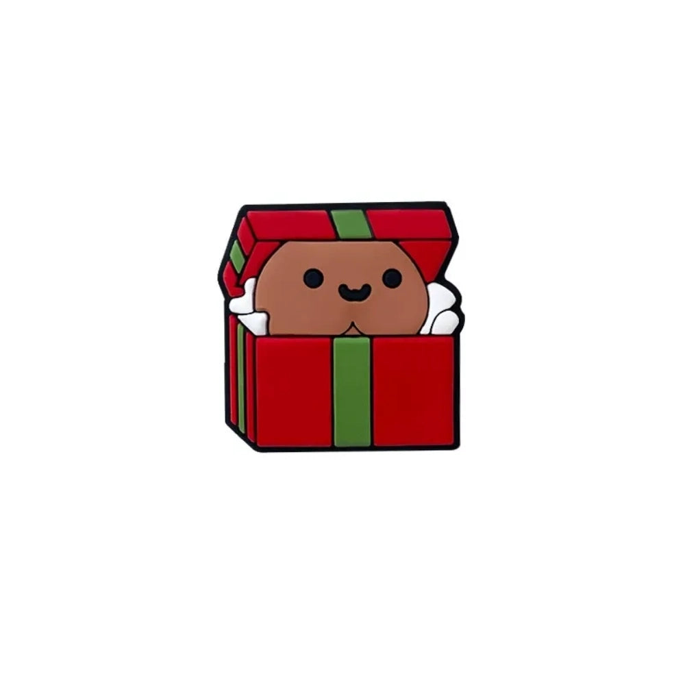 Cute silicone focal beads shaped like red and green Christmas gift boxes with smiling character faces peeking out, shown in multiple skin tone variations on a wooden display tray. - 4