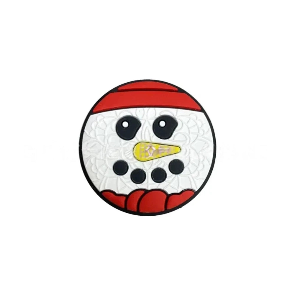 Six round Christmas silicone focal beads featuring snowman and penguin designs with red and green hats displayed on a white tiered stand with holiday decorations on a pink background. - 3