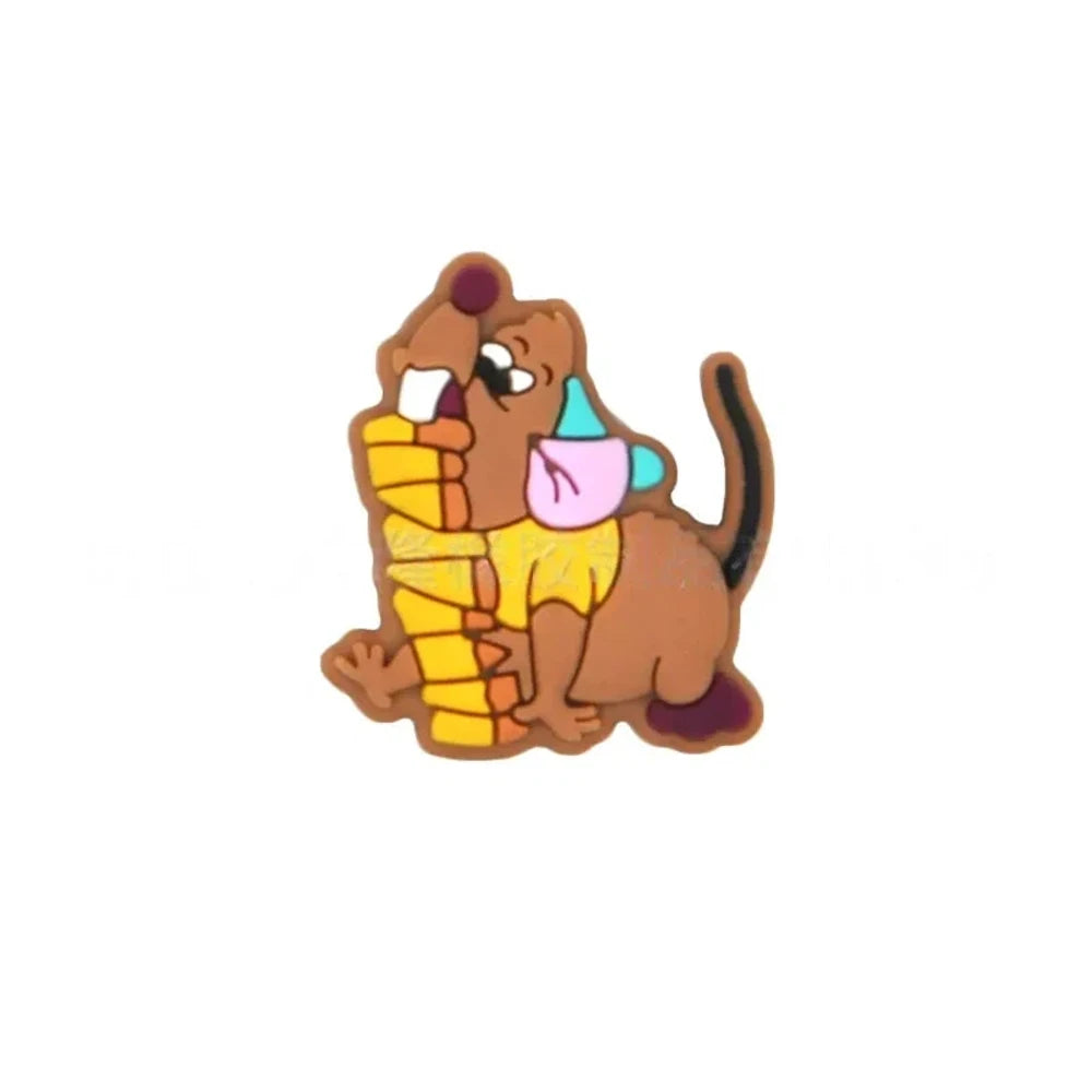 Silicone focal bead shaped like a brown dog eating a yellow ice cream cone with teal and pink scoops, shown on white background.