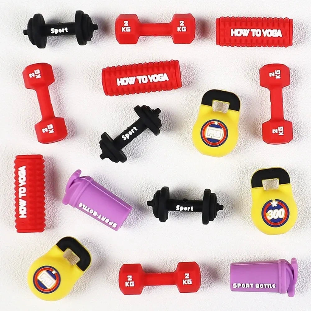 Assorted gym fitness silicone focal beads including red and black dumbbells, yellow kettlebells, purple sport bottles, and yoga roller designs for DIY beadable pens and keychains