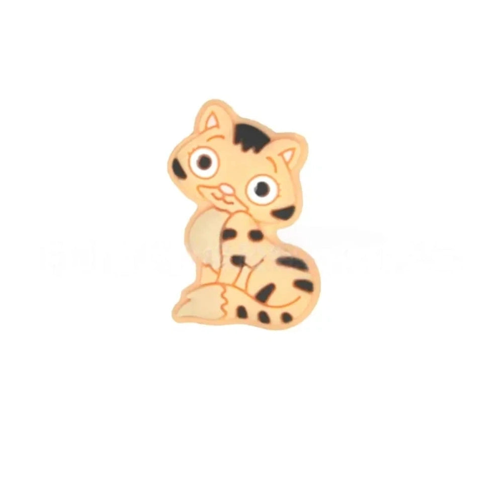Set of 6 cartoon kitten cat silicone focal beads in orange, gray, blue, pink, brown, and black colorways with stripe tabby pattern detail on white background - 6