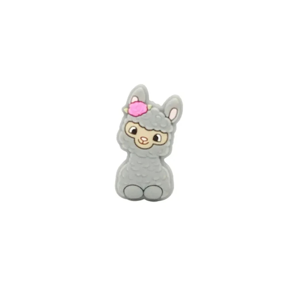 Ten colorful silicone llama alpaca focal beads in white, pink, light pink, cream, peach, green, gray, yellow, blue, and dark brown, displayed in two rows on a white background. - Gray