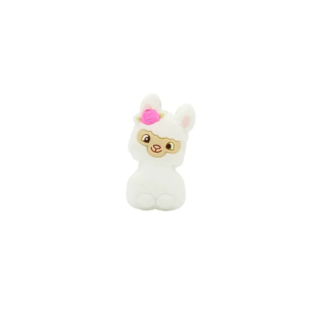 Ten colorful silicone llama alpaca focal beads in white, pink, light pink, cream, peach, green, gray, yellow, blue, and dark brown, displayed in two rows on a white background. - White