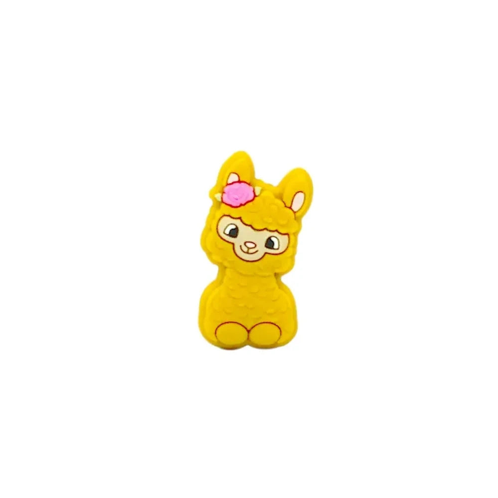 Ten colorful silicone llama alpaca focal beads in white, pink, light pink, cream, peach, green, gray, yellow, blue, and dark brown, displayed in two rows on a white background. - Yellow