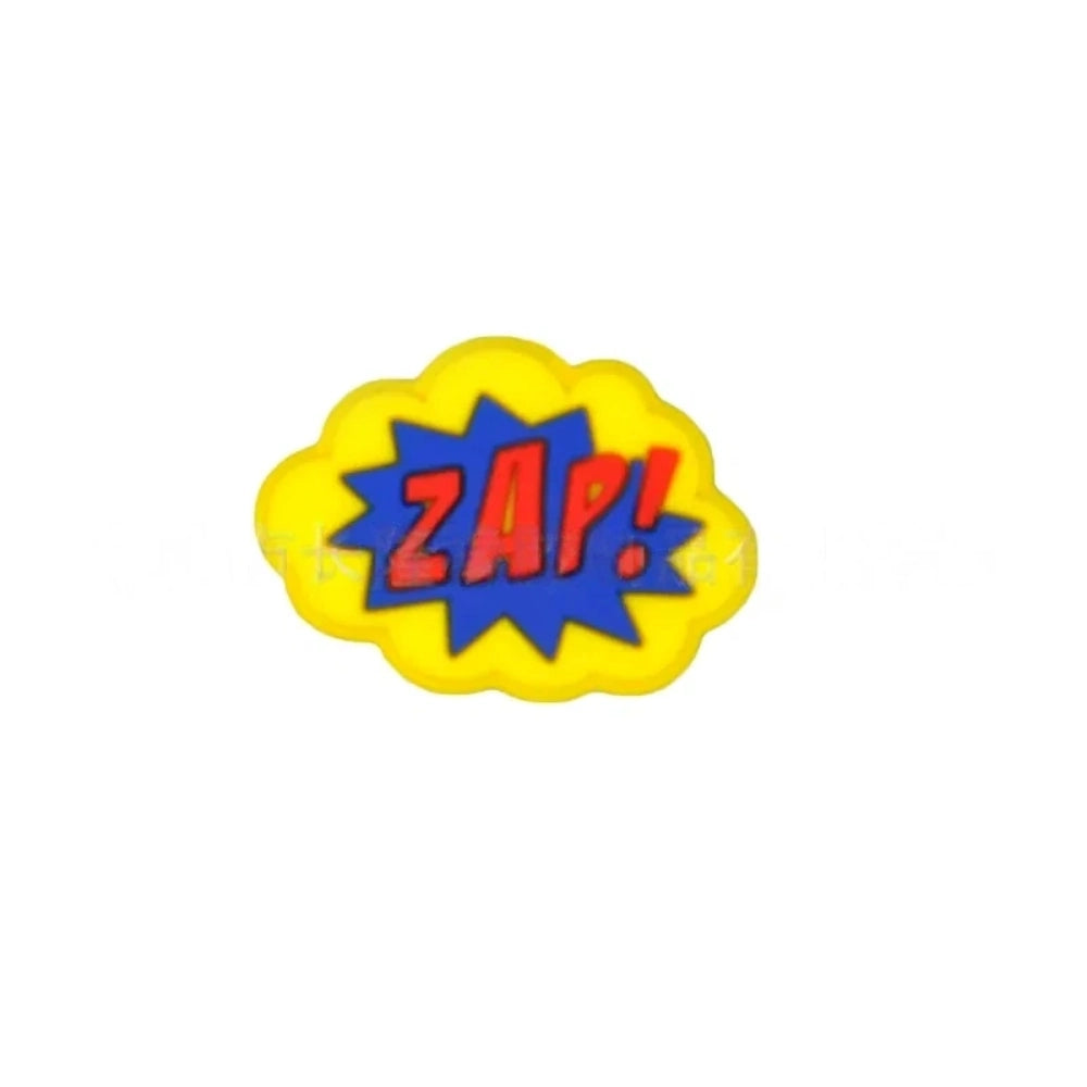 Colorful POW, BOOM, and ZAP superhero comic book silicone focal beads in blue, yellow, and light blue displayed on a white shell dish, perfect for beadable pens, keychains, and badge reels. - 7