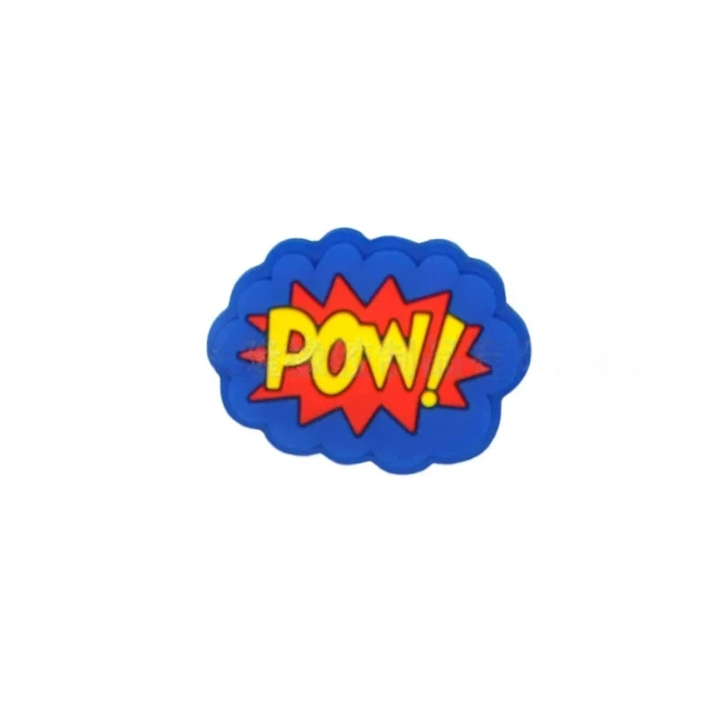 Colorful POW, BOOM, and ZAP superhero comic book silicone focal beads in blue, yellow, and light blue displayed on a white shell dish, perfect for beadable pens, keychains, and badge reels. - 8