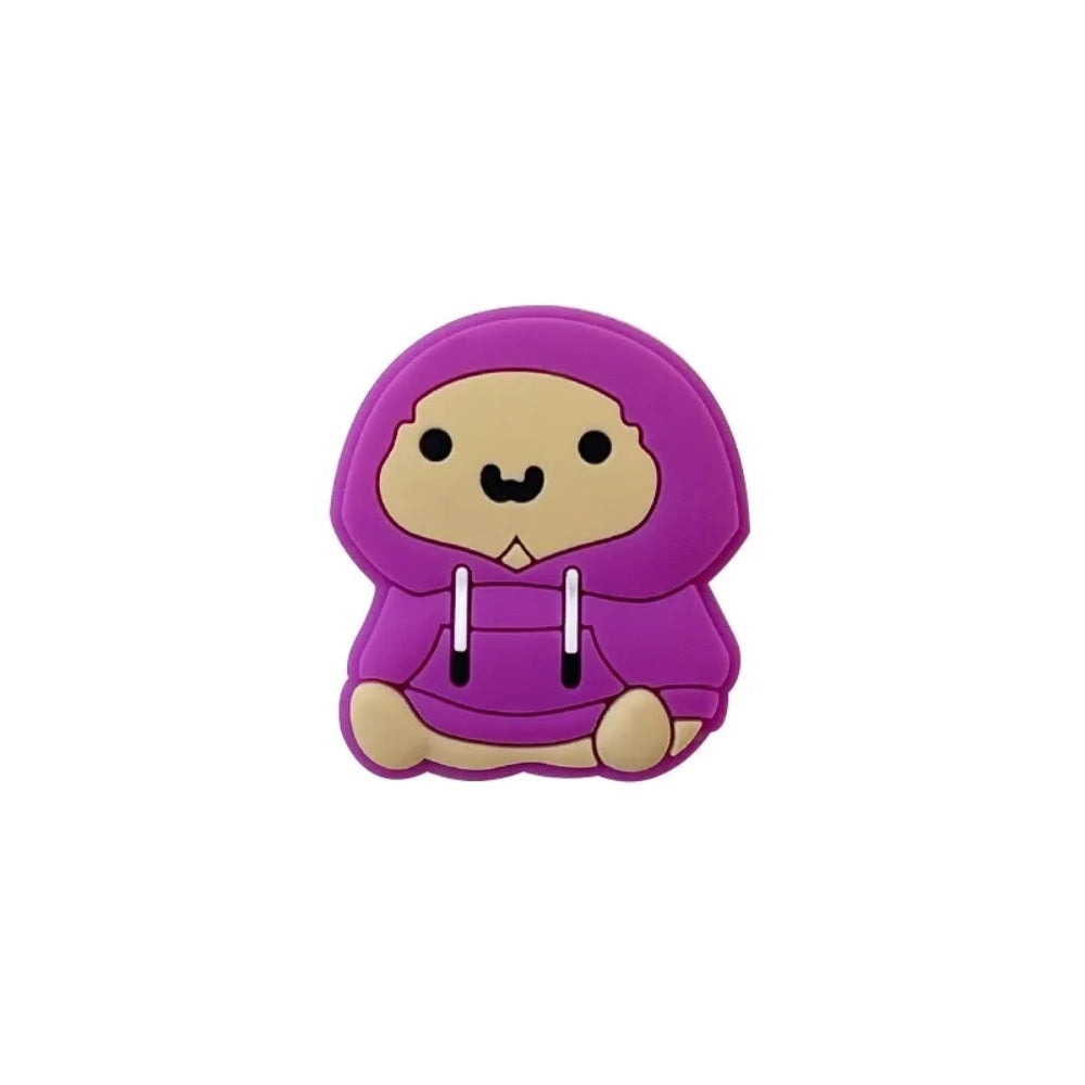 Four purple hoodie bear silicone focal beads in varying skin tones, sitting pose, displayed on a miniature white wooden bench with yellow background. - 2