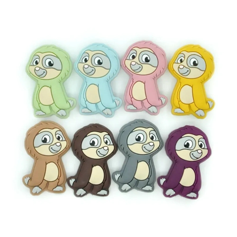 Eight colorful sloth silicone focal beads in green, blue, pink, yellow, tan, brown, gray, and purple, 3D character flatback beads for DIY crafts. - Random Mixed