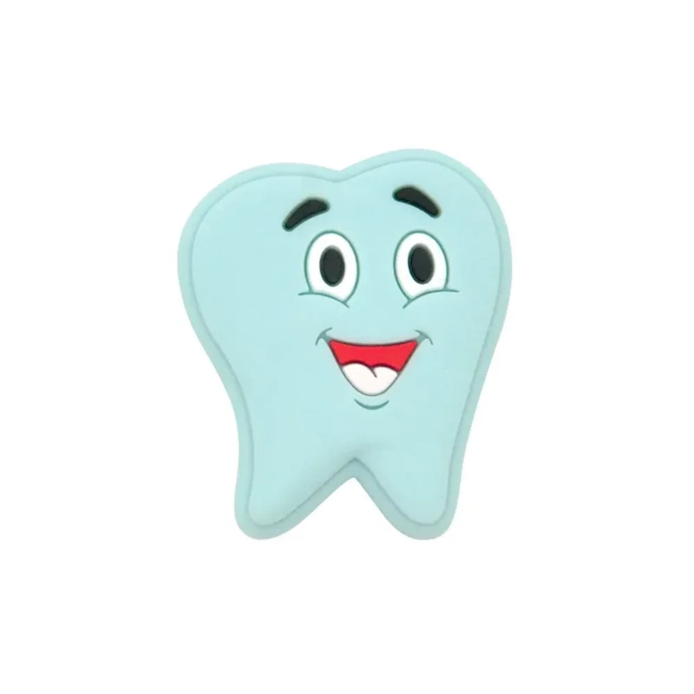 Assorted pastel smiling tooth shaped silicone focal beads in white, pink, blue, green, and gray with cartoon faces, strung on cord and displayed in a white tray on a blue background. - Royal Blue