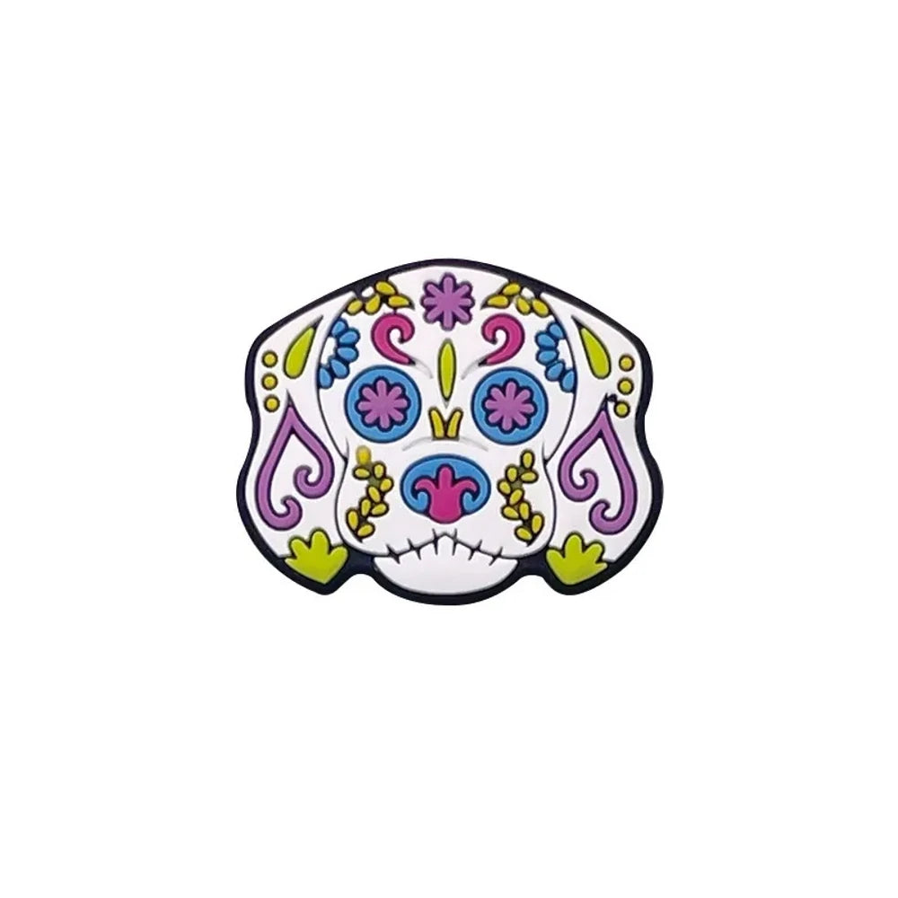 Sugar skull cat silicone focal beads in colorful Day of the Dead floral design, shown assembled on beaded keychains with pink, blue, tan, and natural wood beads on a pink background. - Dog