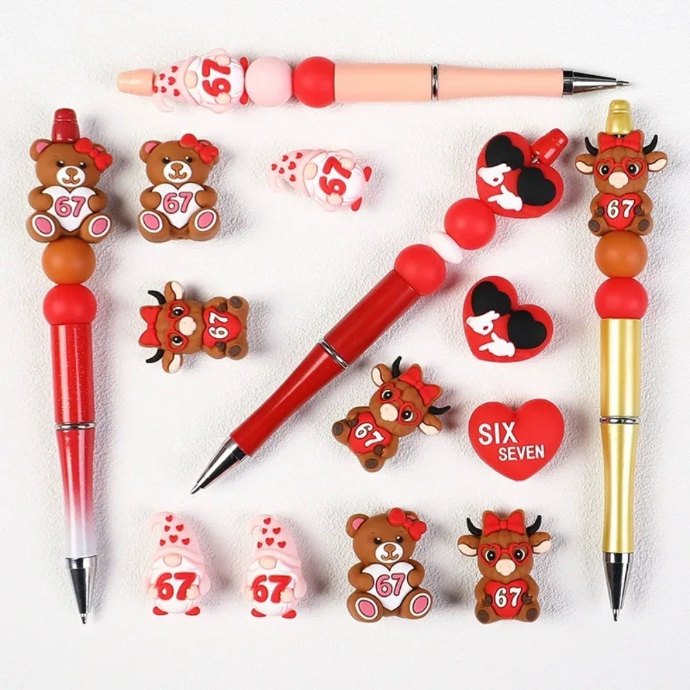 Assorted Valentine's Day silicone focal beads featuring teddy bears holding 67 hearts, highland cows with red bows, heart-shaped sunglasses, gnomes, and SIX SEVEN heart beads in red and pink tones - Random Mixed