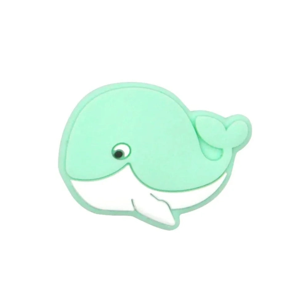 Eight cute whale silicone focal beads in assorted pastel and bold colors including pink, mint, blue, gray, and teal on a white background. - 1