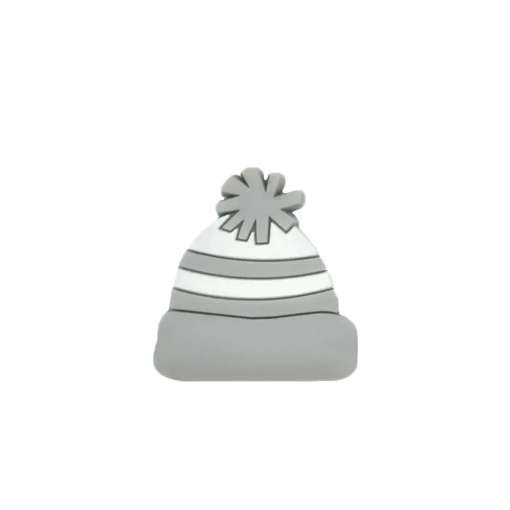 Six colorful silicone winter beanie hat focal beads with pom poms in hot pink, teal, blue, red, light pink, and peach arranged in a star pattern on a white background. - Light Gray
