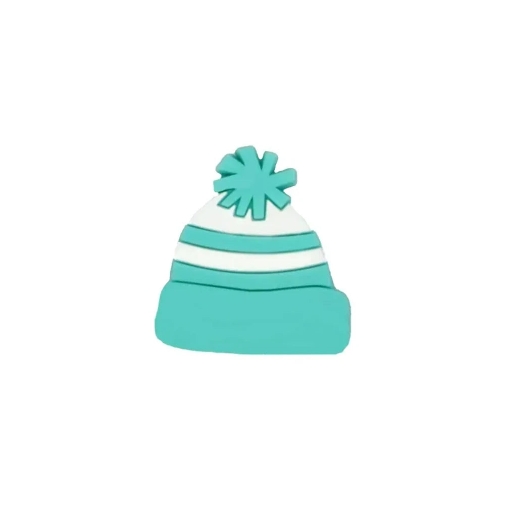 Six colorful silicone winter beanie hat focal beads with pom poms in hot pink, teal, blue, red, light pink, and peach arranged in a star pattern on a white background. - Turquoise