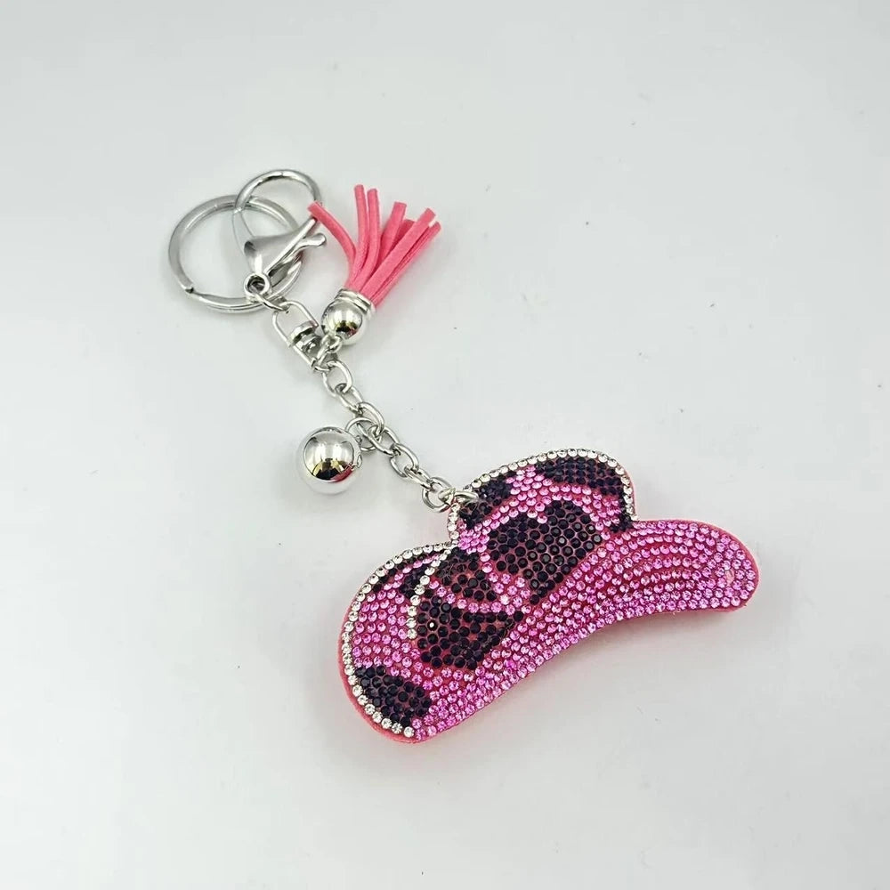 Assorted animal print rhinestone cap shaped fancy beads in gold, red, black white, blue, and pink - Pink