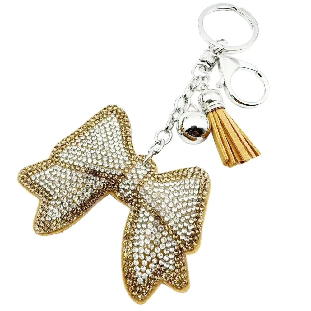 Pink and black bling bow rhinestone fancy beads with tassels, bell charms, and silver keychain hardware - Khaki