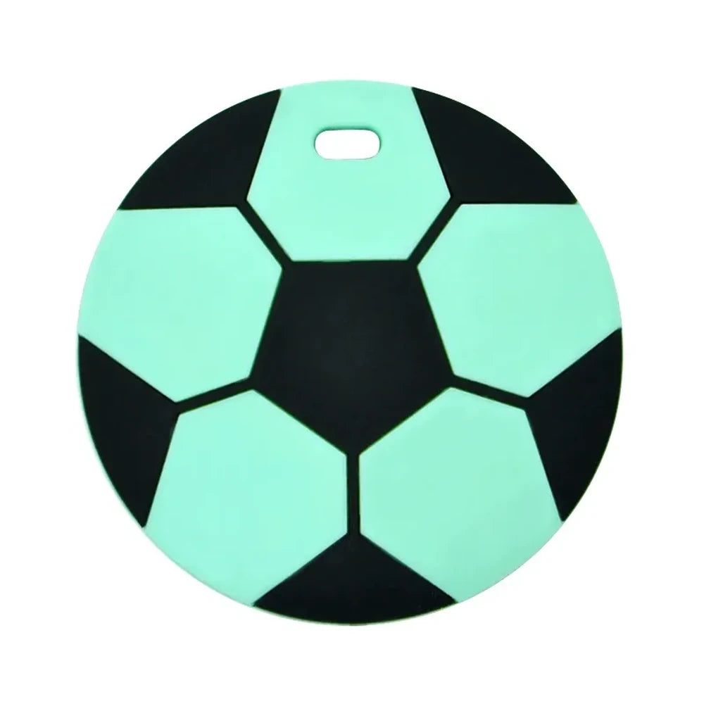 Eight soccer ball silicone flatback focal beads in assorted colors including black and white, yellow, red, blue, grey, mint, light blue, and sky blue, each with a small hole for crafting. - Mint Green