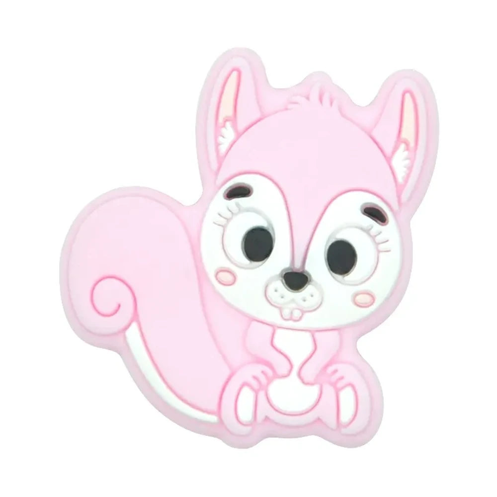 Ten colorful cartoon squirrel silicone focal beads in beige, pink, rose, mauve, brown, blue, green, gray, peach, and yellow arranged in two rows on a white background. - Light Pink