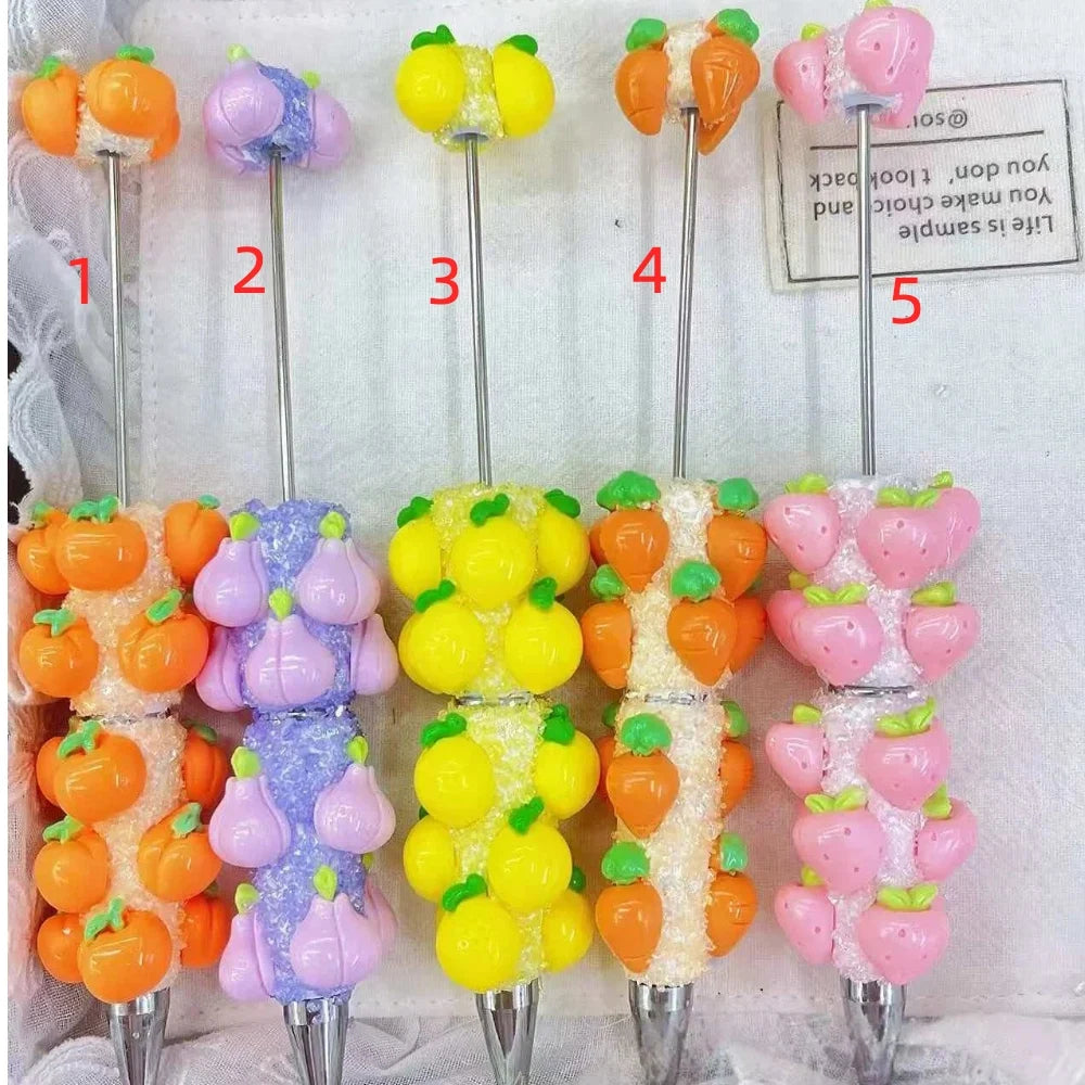 Five fruit mix rhinestone pens with pumpkin, pear, lemon, carrot, and strawberry accents.