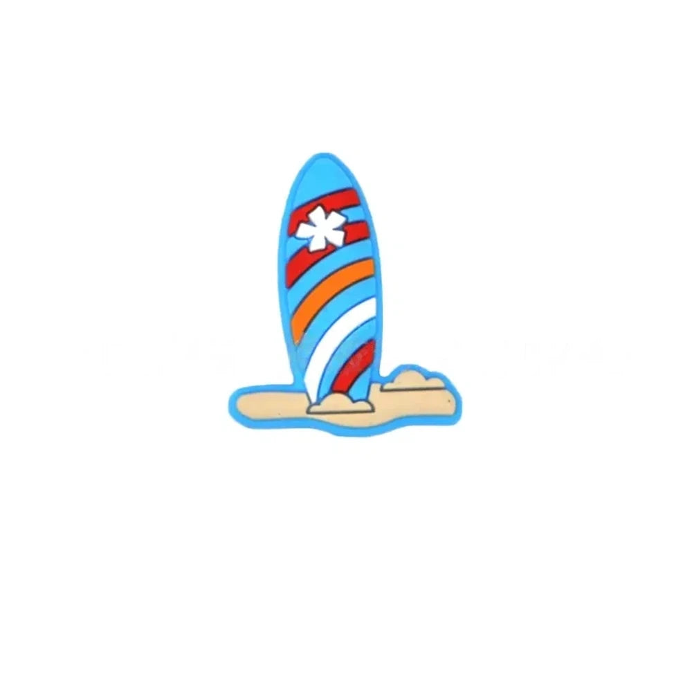 Colorful striped surfboard silicone focal beads in blue and white with flower detail, displayed in a white shell-shaped dish on a light blue background. - Sky Blue