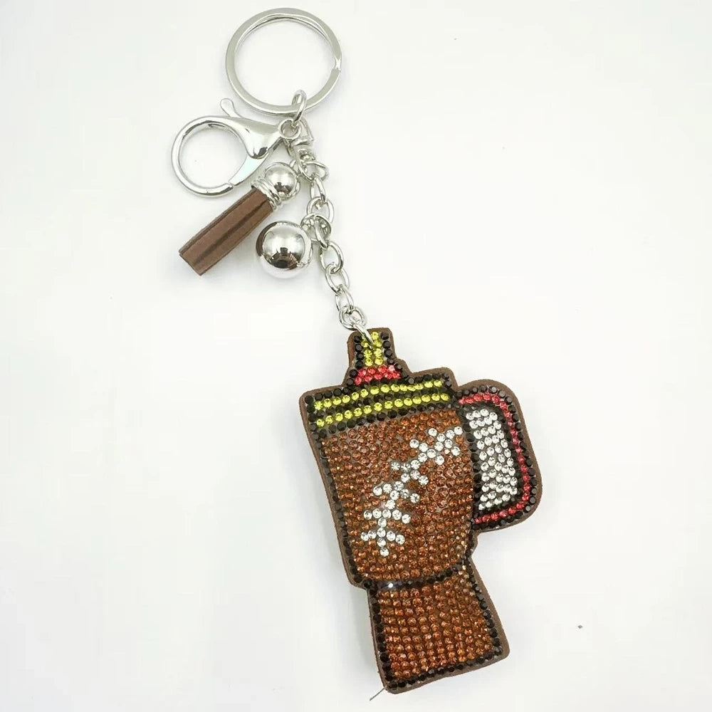 Three moka pot coffee maker rhinestone fancy beads in orange, white, and brown with tassels and silver keychain clasps. - 4